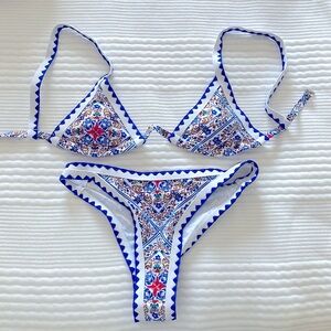 White and blue floral bikini, never worn, medium but runs small